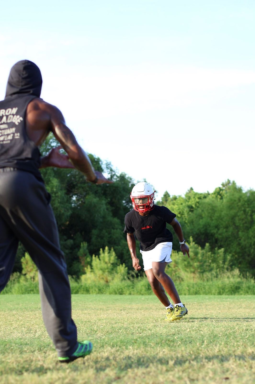 Coach Zay in the lab with an athlete